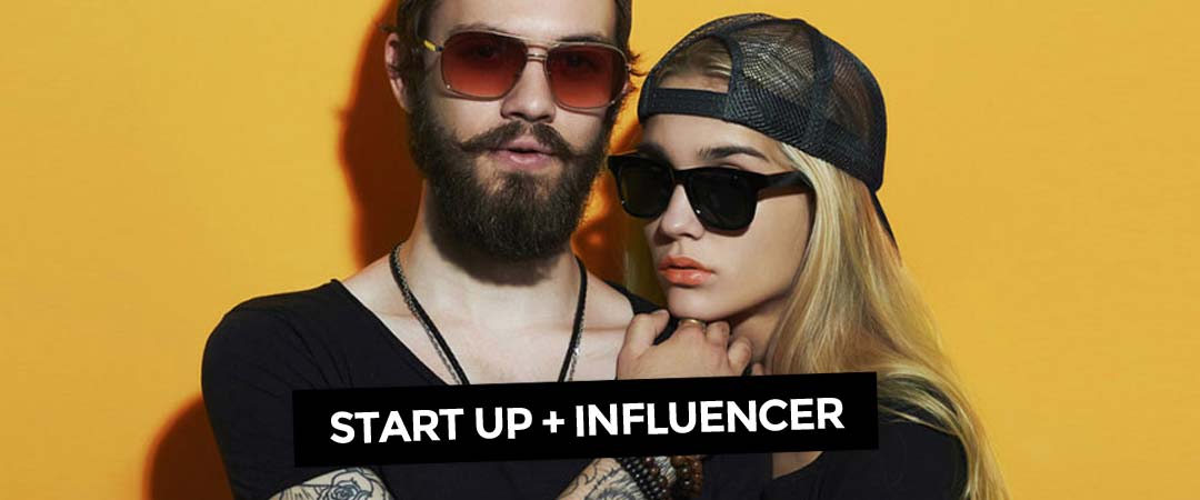 startups-influencer-marketing-work-couple-girl-boy-yellow-wall